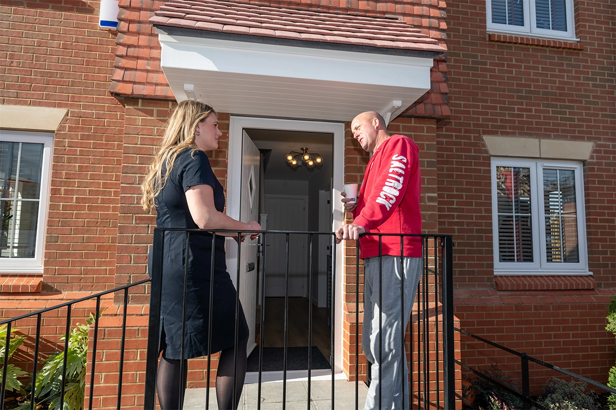 Bellway sales advisor Jessica Sayer shows Dave Lever the Thespian showhome Picture: Bellway