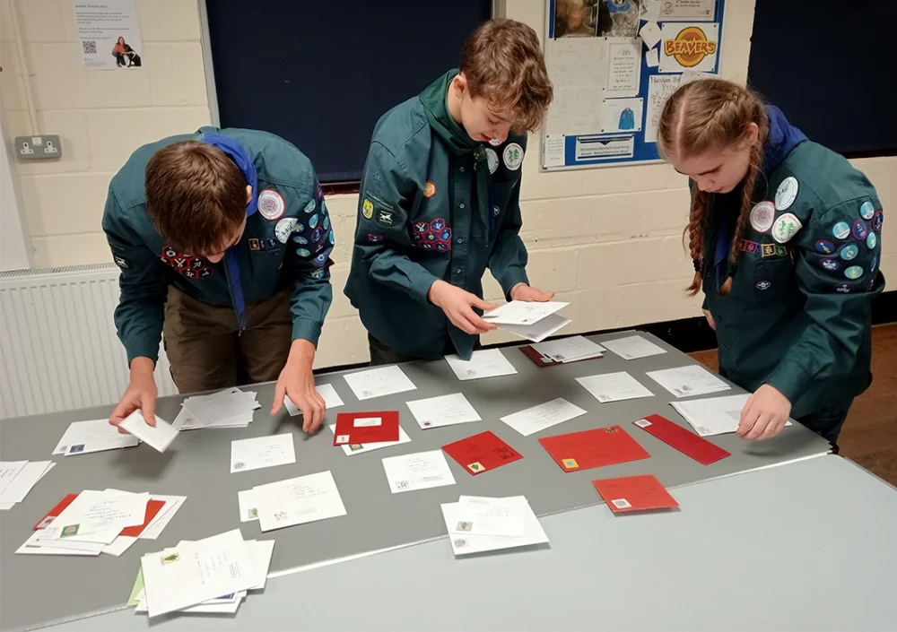 Scouts checking the cards before delivery Picture: Mark Warner