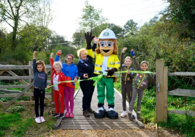 Fordingbridge Girlguiding members joined up with Pennyfarthing Homes to celebrate the opening Picture: Pennyfarthing Homes
