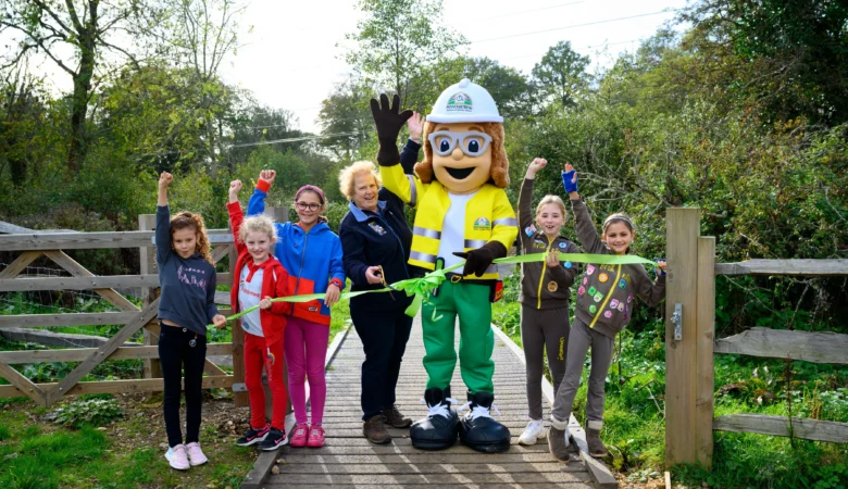 Fordingbridge Girlguiding members joined up with Pennyfarthing Homes to celebrate the opening Picture: Pennyfarthing Homes