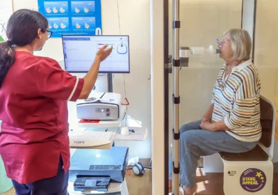 Kirsty Dudin using the lung function machine. Picture: Spencer Mulholland