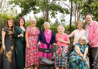 Former James Bond actress Madeline Smith, standing second from right, at Colten Care’s Braemar Lodge care home in Salisbury. Joining her for the training video premiere are, from left: Lydia Shanley, Colten Care Learning & Development Partner, Jessica Salway, Clinical Assurance Manager, Braemar Lodge Home Manager Jackie Cash, residents Sheila Nell, Mary Wilson and, seated, Catherine Brighty, and video director Pete Doherty.